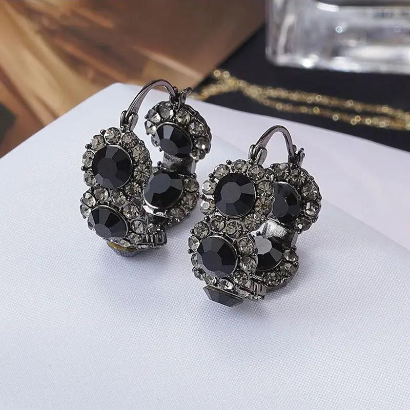 Interlocking circle crystal stud earrings, gunmetal black | Hair Your Lux