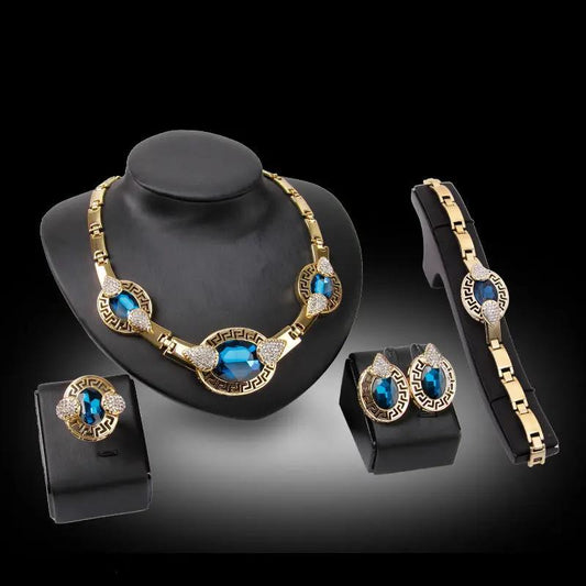 Crystal statement jewellery set, gold-tone with blue stones | Hair Your Lux