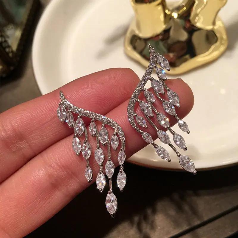 Crystal angel wing drop earrings with teardrop fringe, silver-tone | Hair Your Lux