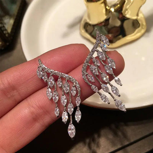 Crystal angel wing drop earrings with teardrop fringe, silver-tone | Hair Your Lux