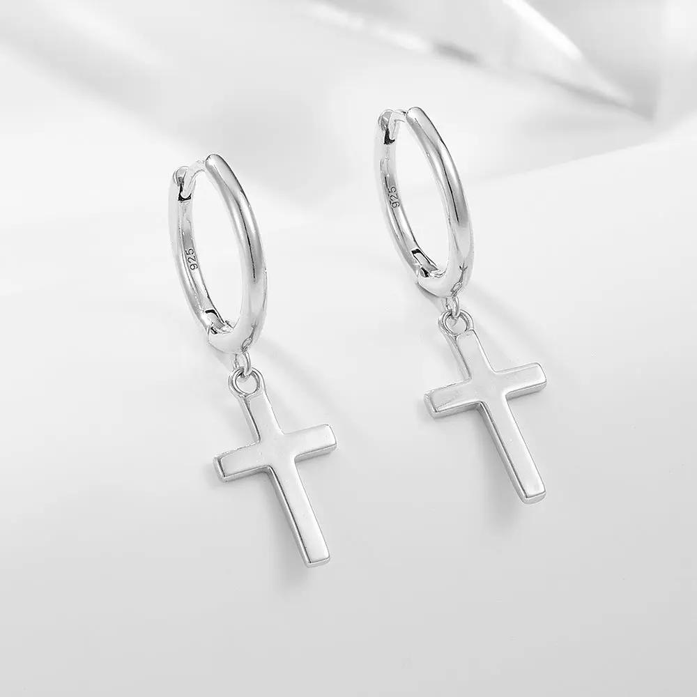 Fine cross charm drop earrings detail | Hair Your Lux