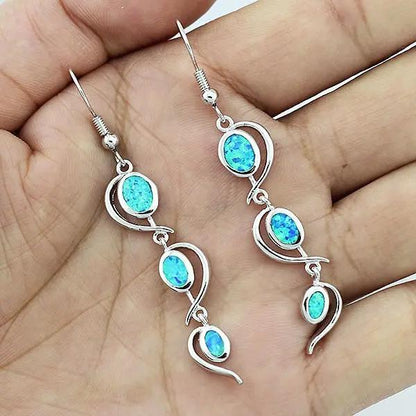 Opal-effect silver drop earrings, iridescent blue stones | Hair Your Lux