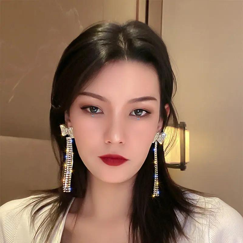 Rhinestone fringe bow drop earrings, gold-tone | Hair Your Lux