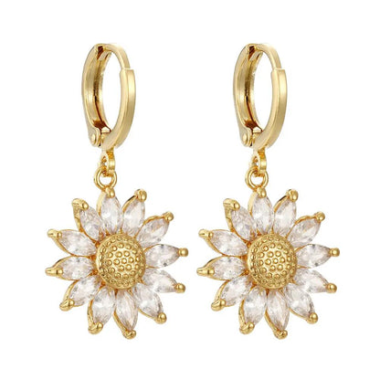 Gold huggie hoop with crystal daisy sunflower charm | Hair Your Lux
