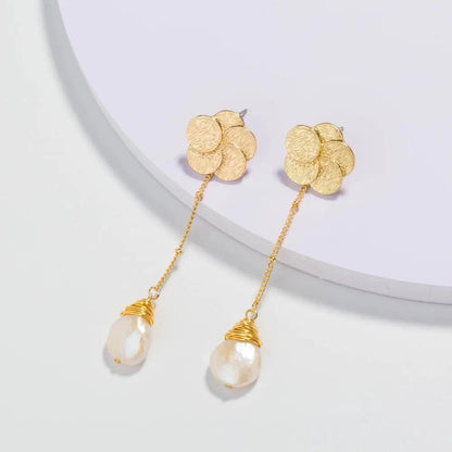Gold flower stud earrings with chain and baroque pearl drop | Hair Your Lux