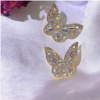 Gold-tone crystal butterfly stud earrings, detail | Hair Your Lux