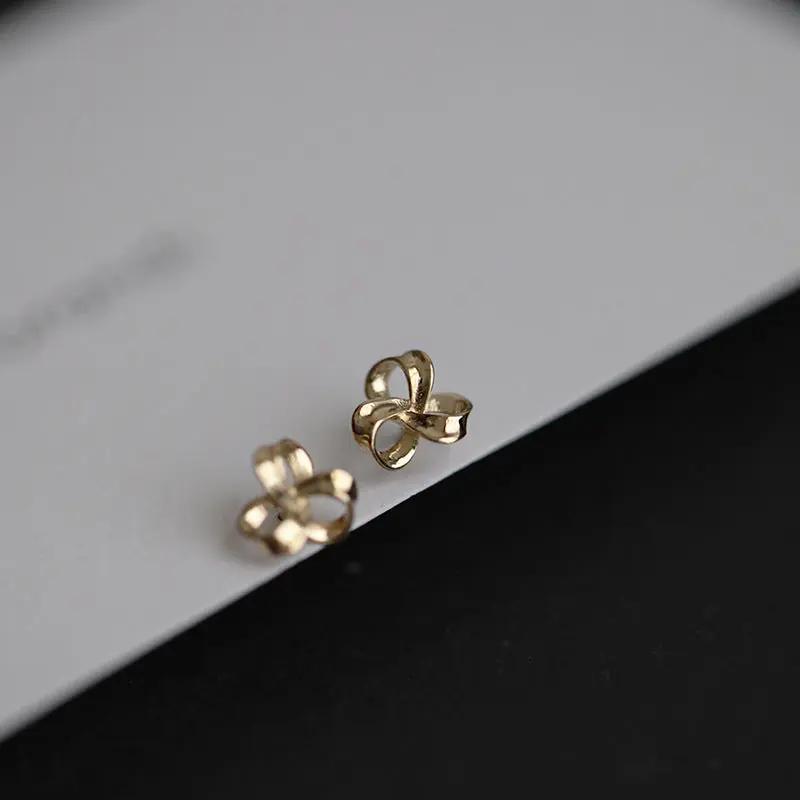 Ribbon knot stud earrings, gold-tone | Hair Your Lux