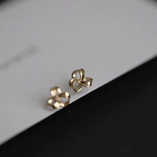 Ribbon knot stud earrings, gold-tone | Hair Your Lux