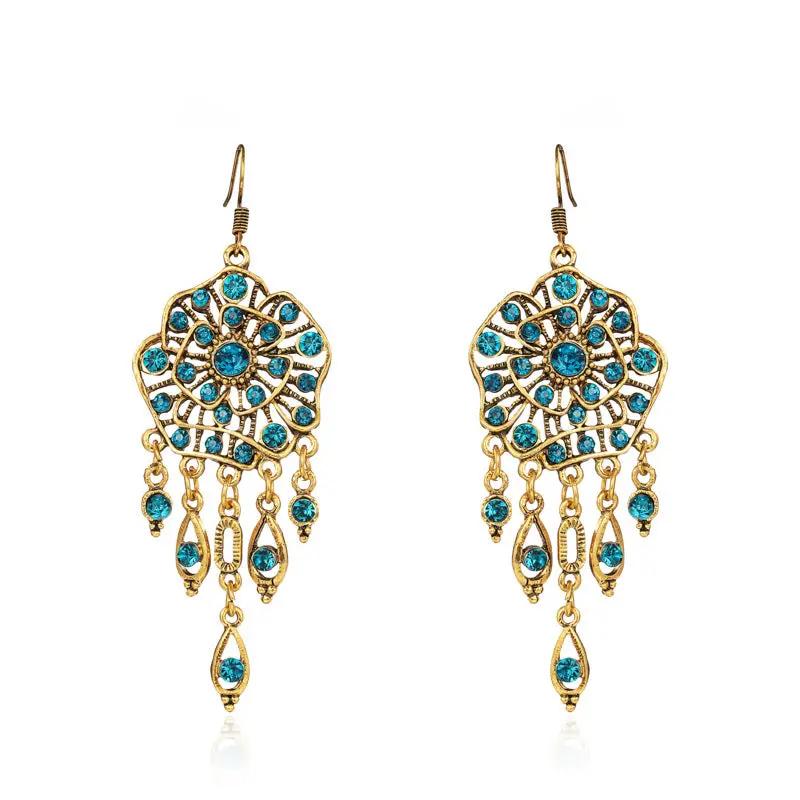 Ornate gold filigree medallion drop earrings with teardrop charms | Hair Your Lux