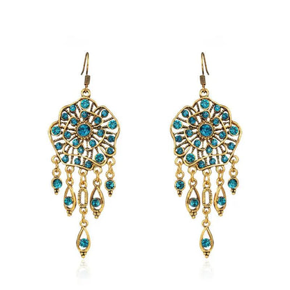 Ornate gold filigree medallion drop earrings with teardrop charms | Hair Your Lux