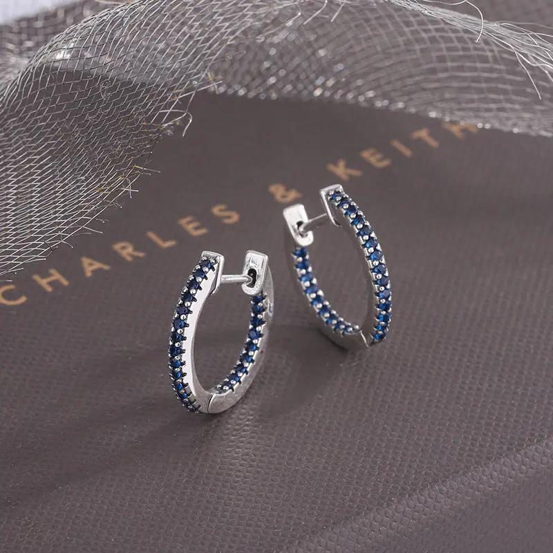 Blue zircon pavé silver huggie hoop earrings | Hair Your Lux