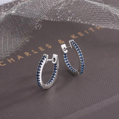 Blue zircon pavé silver huggie hoop earrings | Hair Your Lux