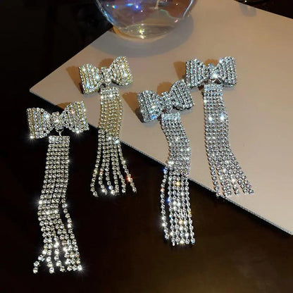 Crystal bow earrings with long rhinestone fringe, silver-tone | Hair Your Lux