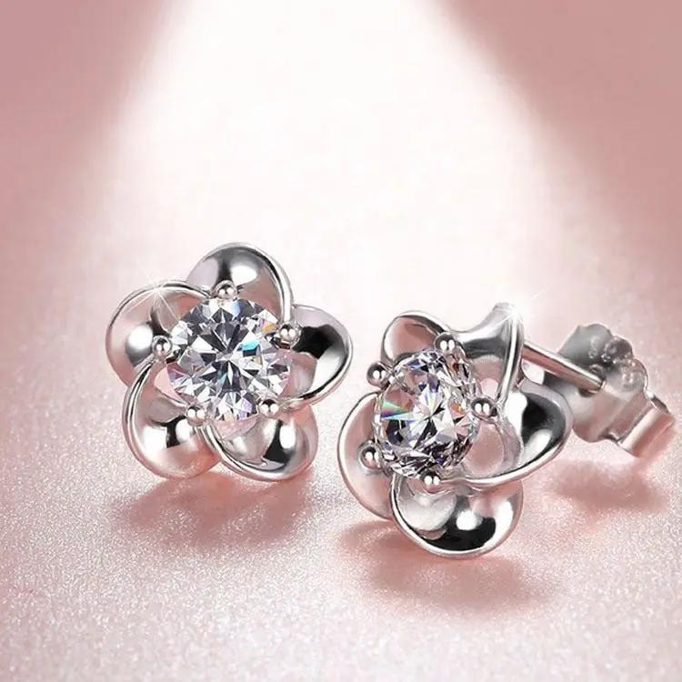 Crystal flower stud earrings, silver-tone cubic zirconia bloom | Hair Your Lux