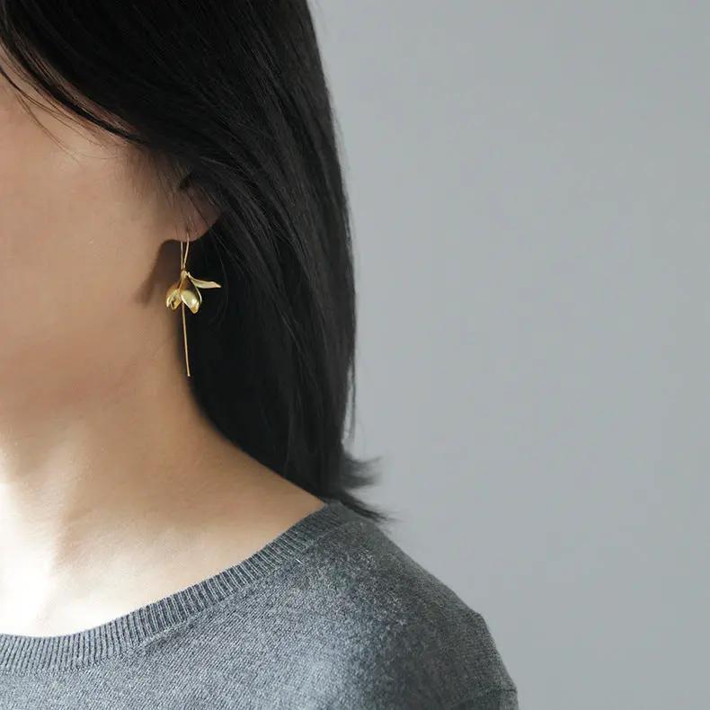Sculptural magnolia bud drop earrings on long hook | Hair Your Lux