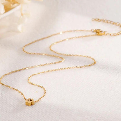 Open-work paw print pendant necklace, gold-tone | Hair Your Lux