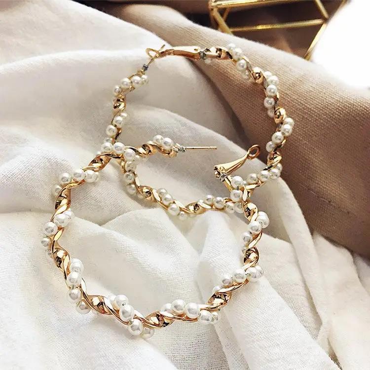 Front-facing pearl and gold twist hoop earrings | Hair Your Lux