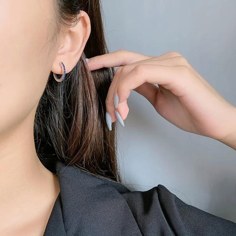 Green zircon silver huggie hoop earrings | Hair Your Lux