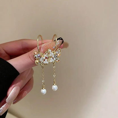 Gold-tone crystal butterfly earrings with pearl-style tassel drops | Hair Your Lux