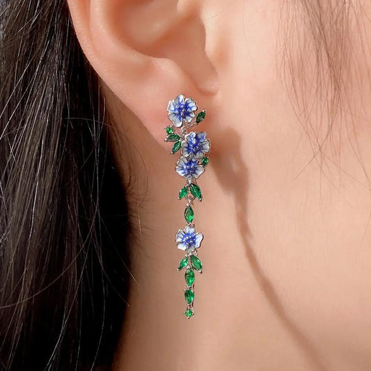 Enamel blue flower chain earrings with green zircon leaves | Hair Your Lux