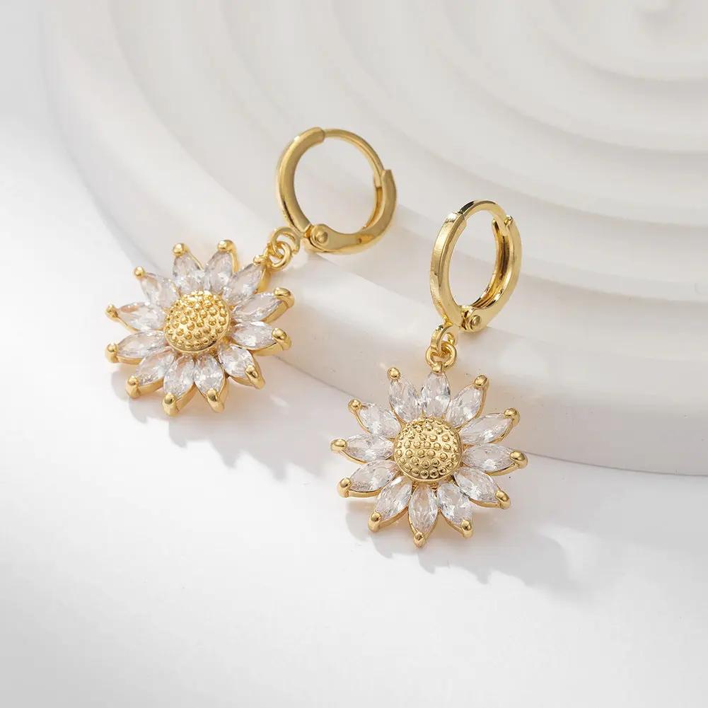 Crystal sunflower huggie hoop earrings, gold-tone | Hair Your Lux
