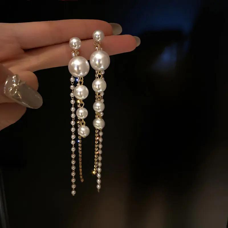 Graduated pearl line with chain tassel drop earrings | Hair Your Lux
